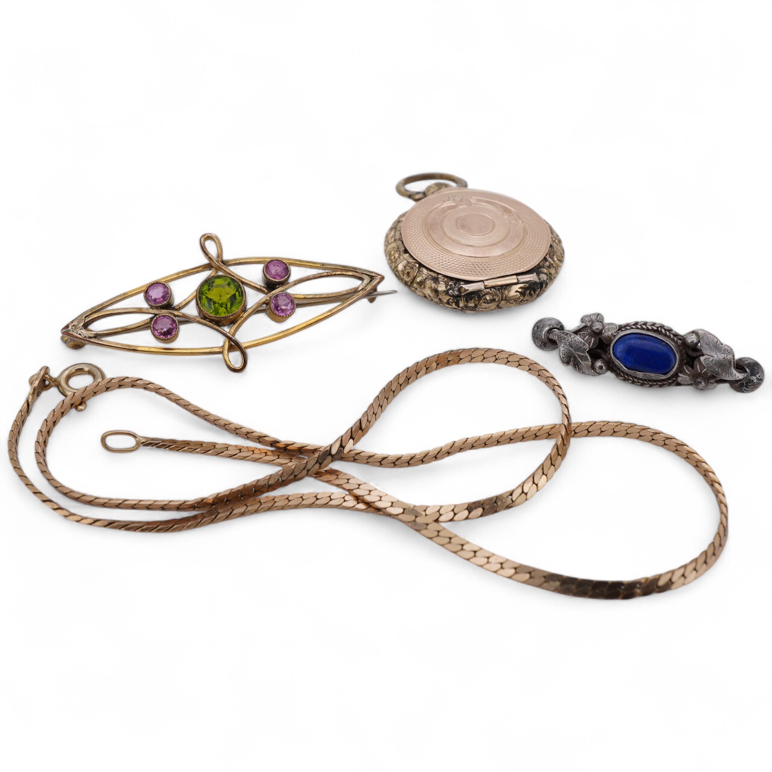 A group of jewels, comprising, a 9ct gold flat curb chain, length 37.5cm, British hallmarks, gross weight 5 grams; a gilt metal locket pendant; an Edwardian gilt metal, green and pink paste brooch; and a silver brooch se